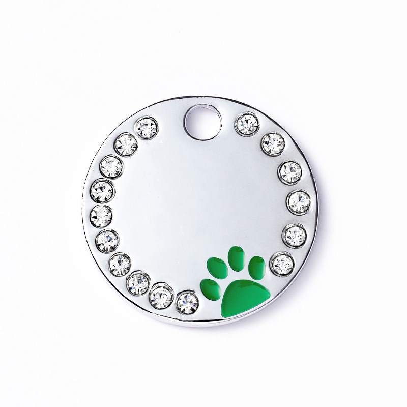 Round pet tag with dog footprint pattern