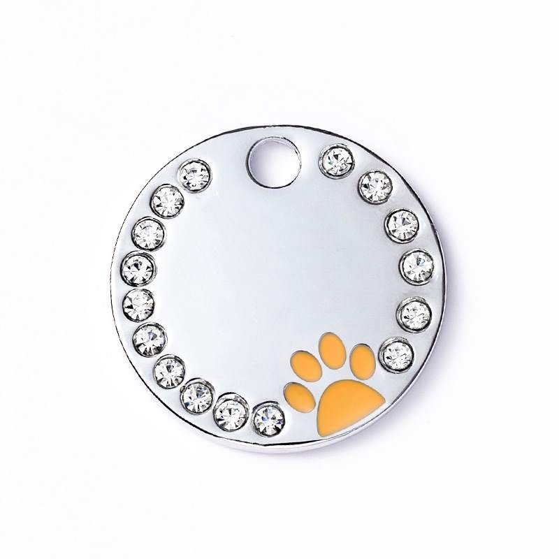 Round pet tag with dog footprint pattern