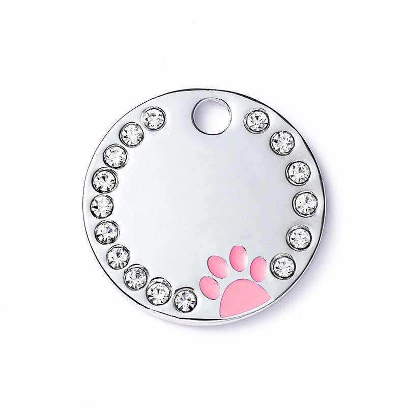 Round pet tag with dog footprint pattern