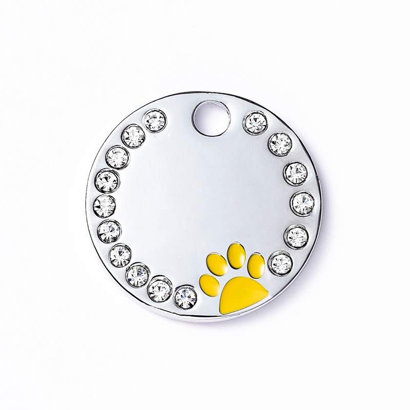 Round pet tag with dog footprint pattern