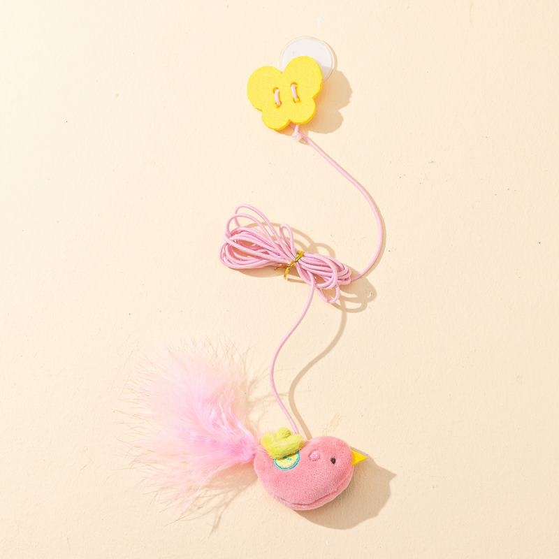 Cat toy hanging in the form of a dragonfly bird