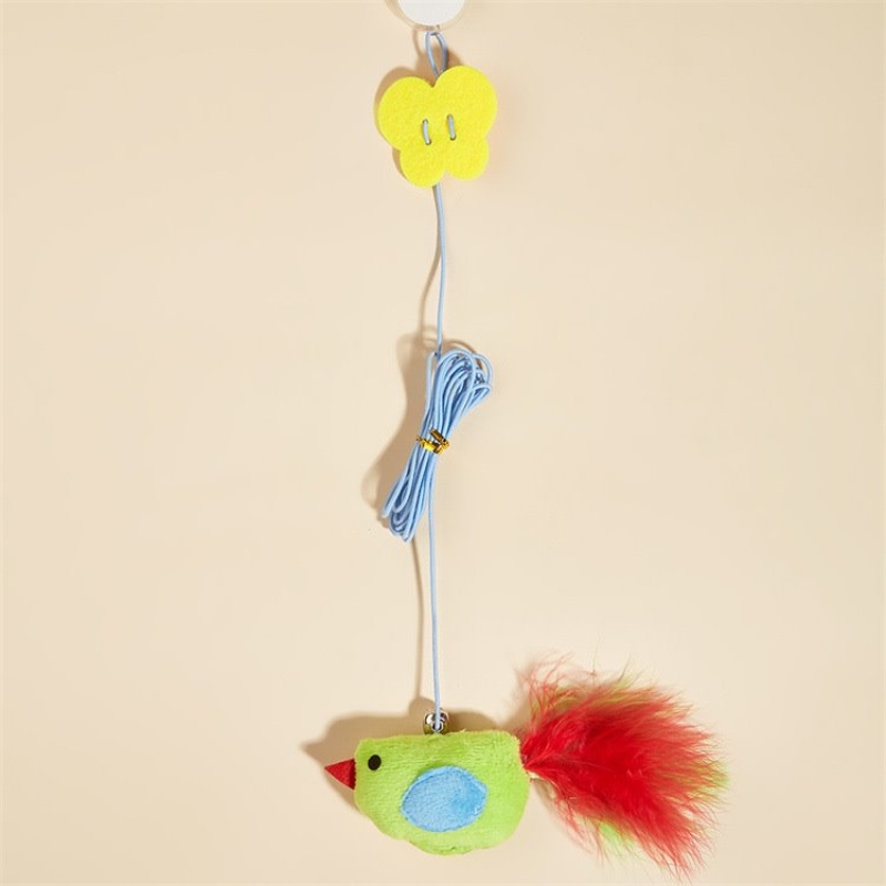 Cat toy hanging in the form of a dragonfly bird