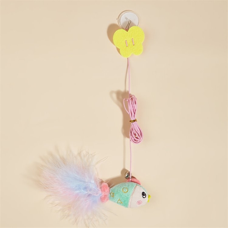 Cat toy hanging in the form of a dragonfly bird